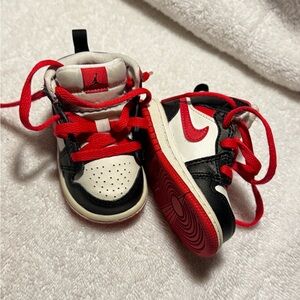 Kids Jordan Black and Red Sneakers